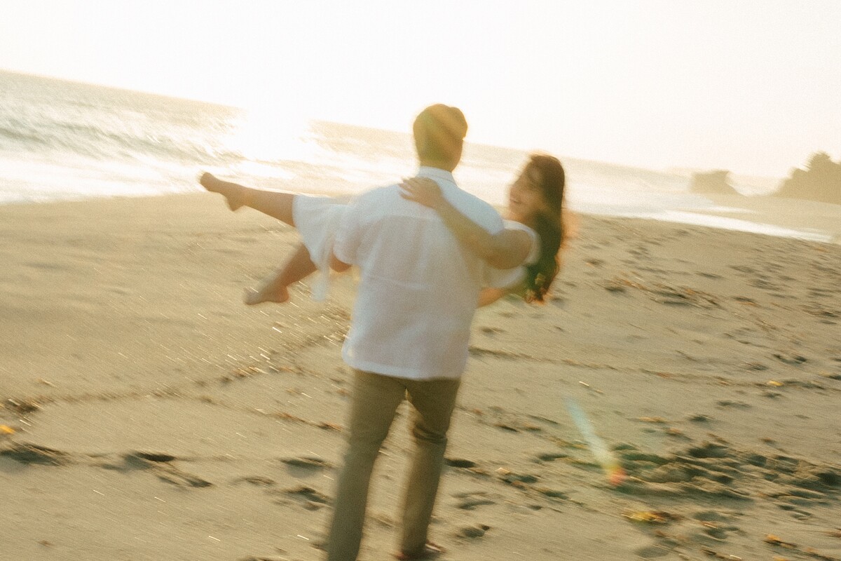 Larissa and Tony dancing on the beach
